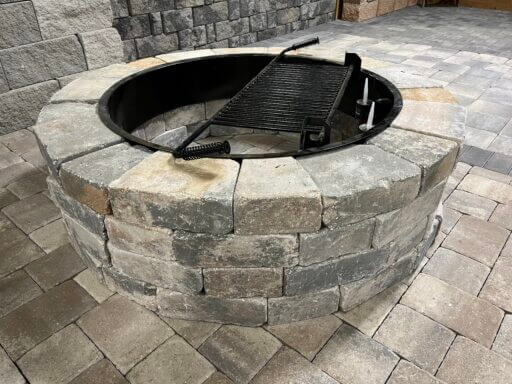 Wall block fire pit at Woerner Landscape